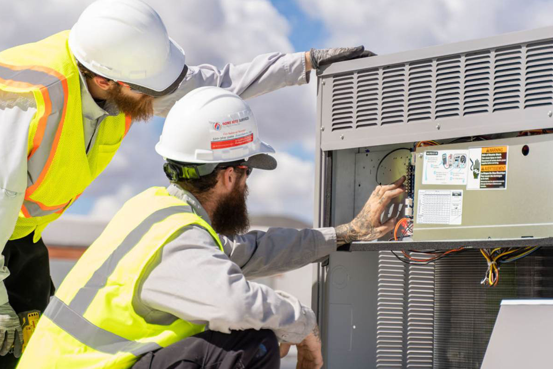 Technician repairing an air conditioner